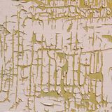 Abstract image featuring a textured surface of peeling paint in shades of pale pink and yellow, creating an intricate pattern.